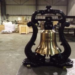 350 mm bronze bell mounted in a cast iron dolphin belfry