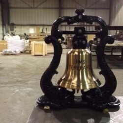 350 mm bronze bell mounted in a cast iron dolphin belfry